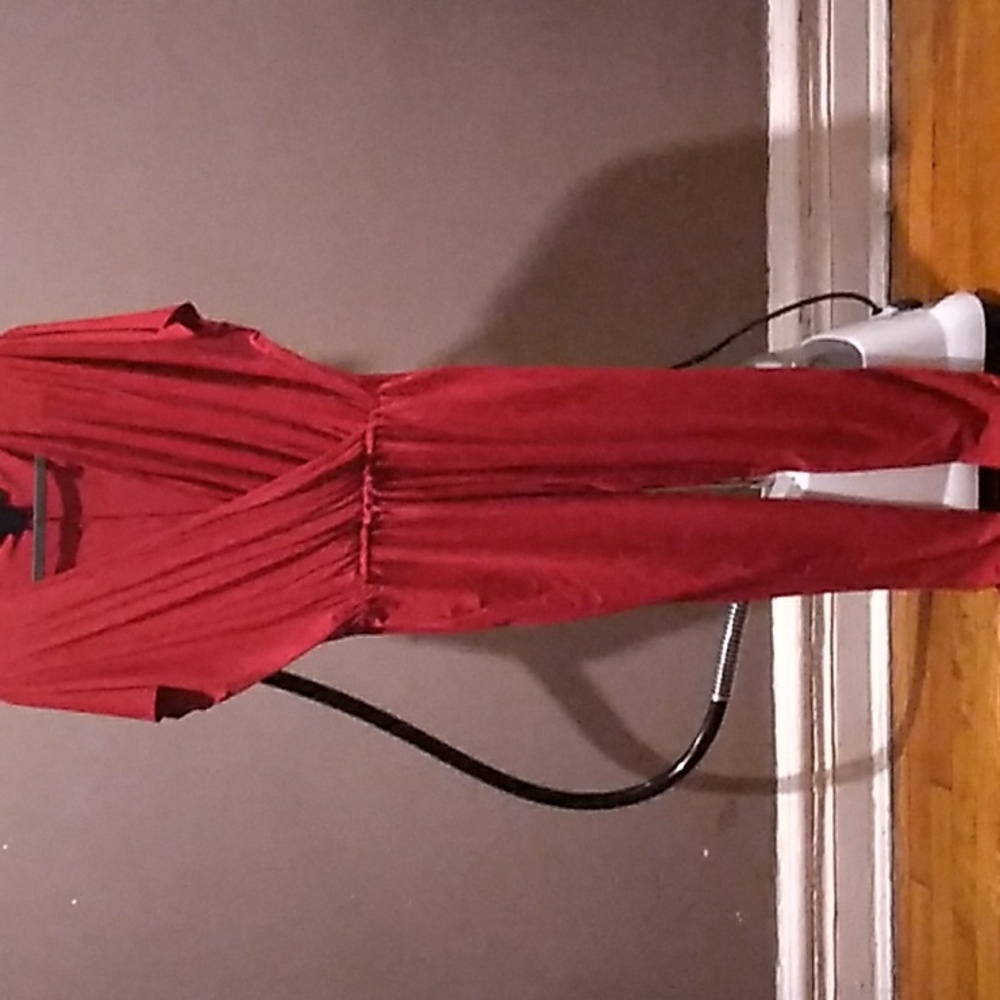 Deep red Kardashian jumper pockets on both sides.